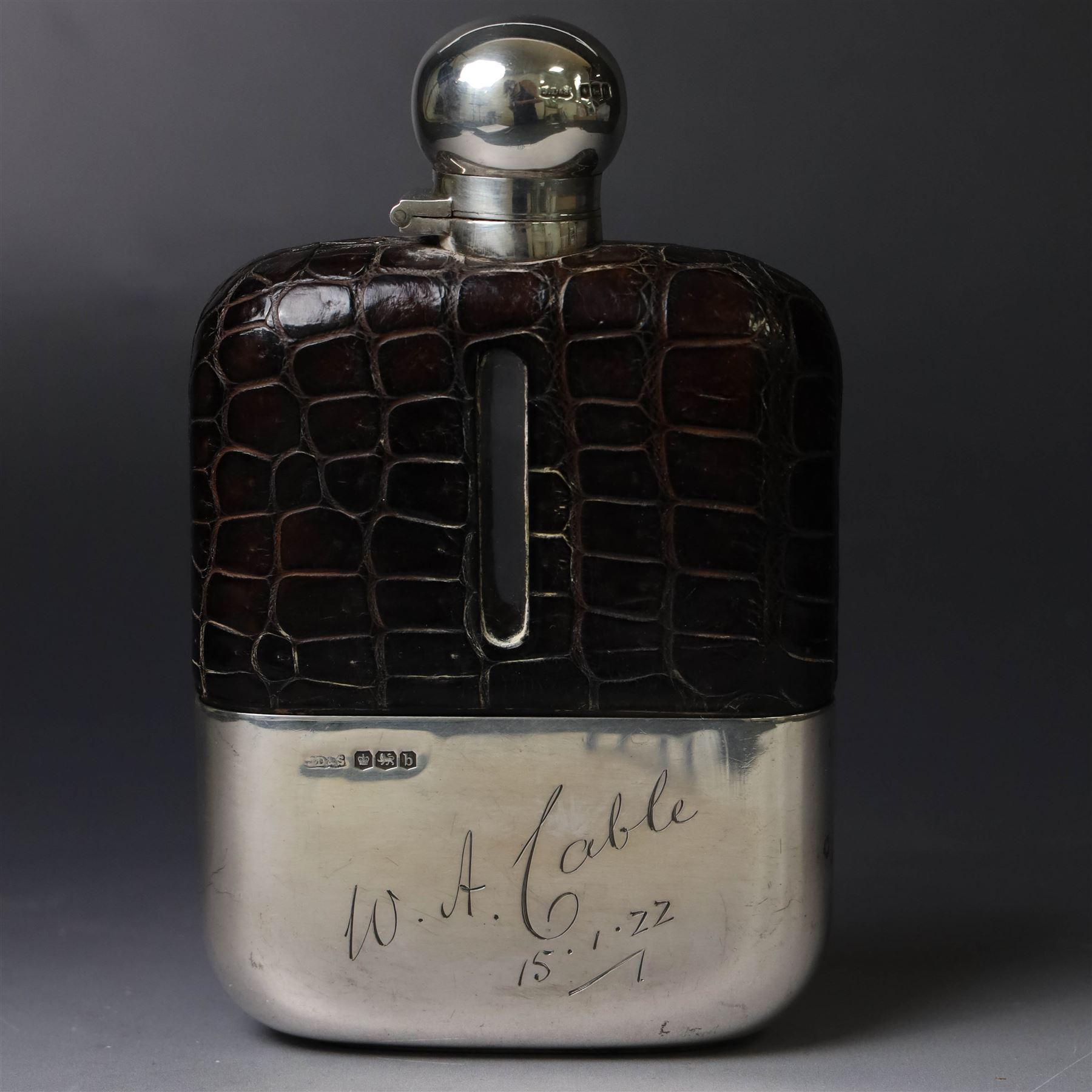 Early 20th century silver and leather mounted glass hip flask, with silver cover and removable silver cup engraved with name and date, hallmarked James Dixon & Sons Ltd, Sheffield 1919, H15cm