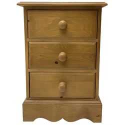 Pair of traditional pine bedside pedestal chests, fitted with three drawers