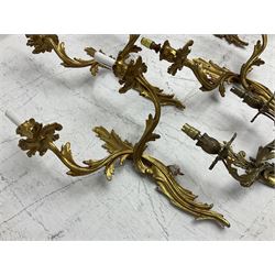 Set of eight Rococo style gilt metal two branch wall sconces, and two five branched ceiling lights, together with a pair of similar wall sconces 