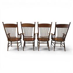 Set of eight 19th century ash and elm spindle back Windsor armchairs, arched top rails above fan-shaped spindle backs, curved arms with turned supports, shaped saddle seats, on turned legs joined by H-stretchers