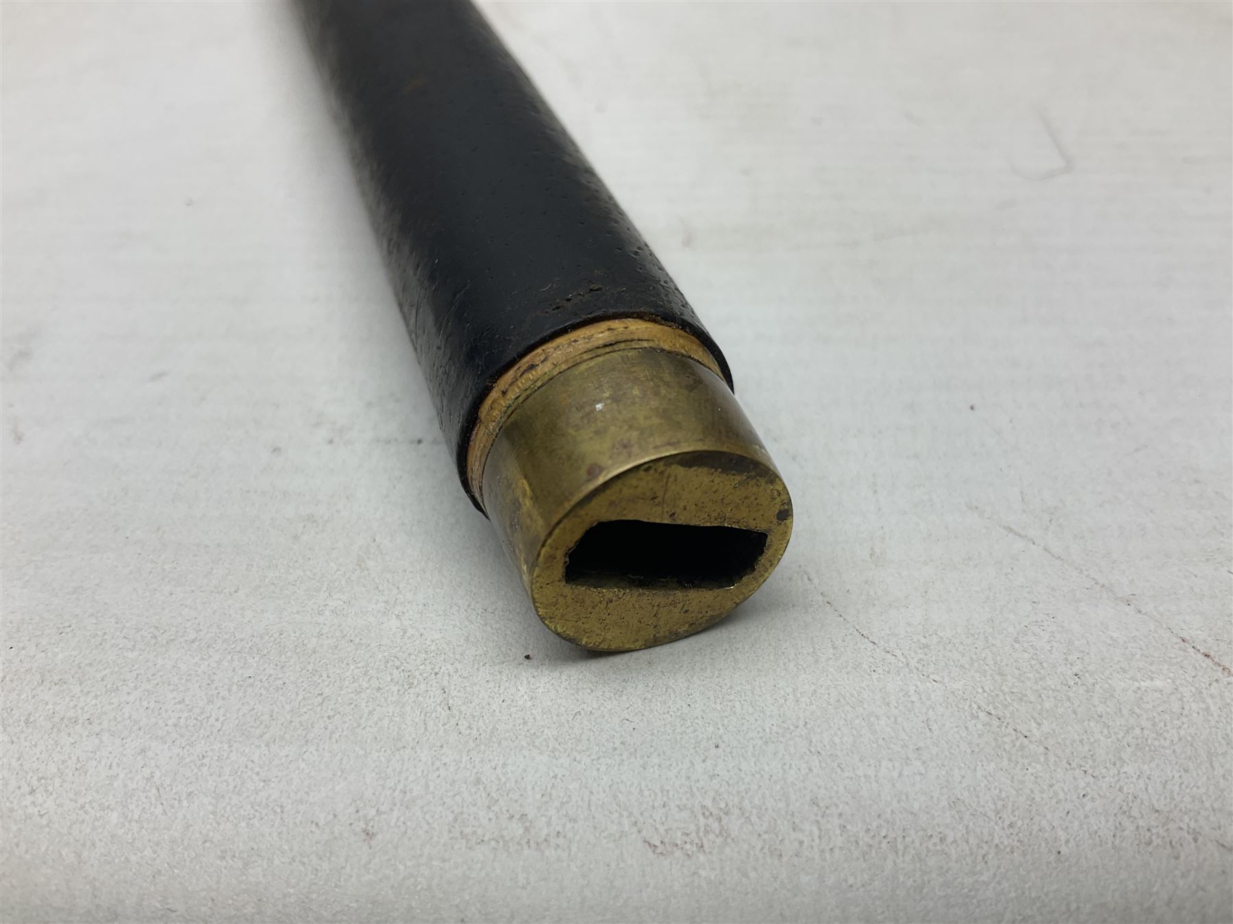 Early 20th century British Army Officer’s leather covered swagger / sword stick by Swaine & Adeney of 185 Piccadilly London; 34.5cm double edged spear point blade with etched foliate decoration and retailer’s details; stamped 'Forged in London' to the edge of the ricasso; L59.5cm overall