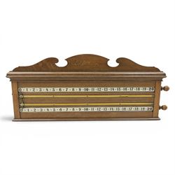 E.J. Riley - 20th century oak billiards scorer, with broken arch pediment with gilt markers mark, with revoling scorer with turned knob, brass indicator, with brass wall hangers