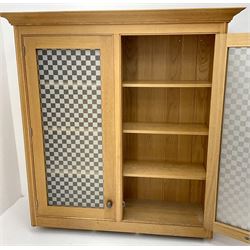 Smallbone light oak bookcase, projecting cornice above two chequered opaque glazed doors enclosing three adjustable shelves