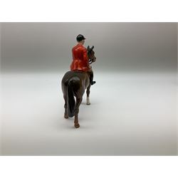 Beswick model of a huntswoman on grey horse model no 1730, and Beswick huntsman on brown horse model no 1501, both with printed mark beneath. 