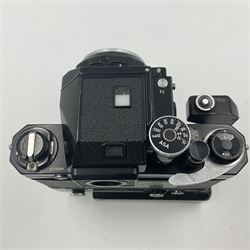 Nikon Photomic TN NKJ camera body, serial no 6728309, circa 1965, with 'Nippon Kogaku NIKKOR-S Auto 1:1.4 f=5.8cm' lens, serial no. 173909, Nikon F36 Motor Drive, serial no.132430 and Nikon cordless battery pack