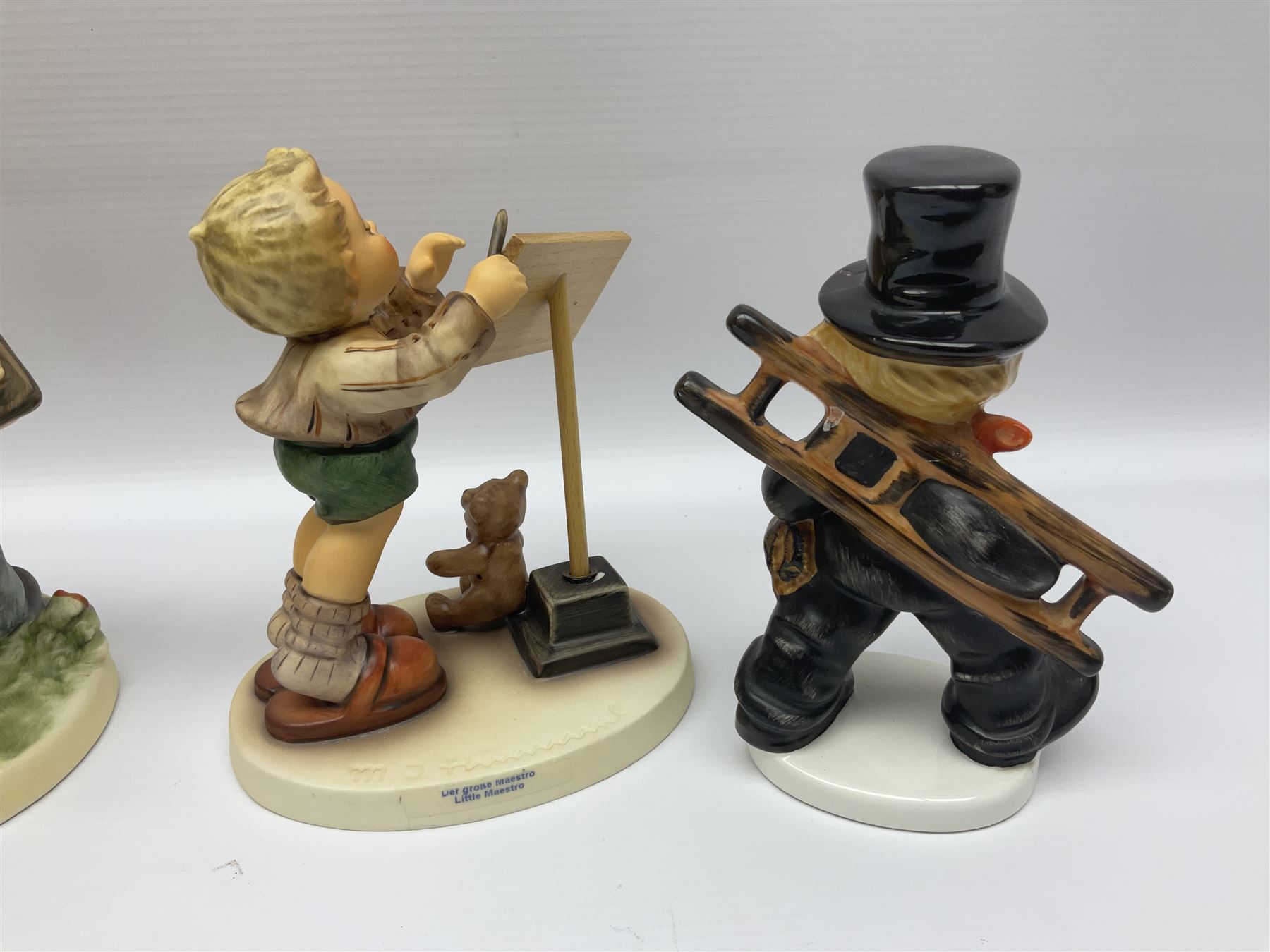 Twenty five Hummel figures by Goebel, to include Tuning up, Blessed Event, Book Worm, The Little Architect etc 