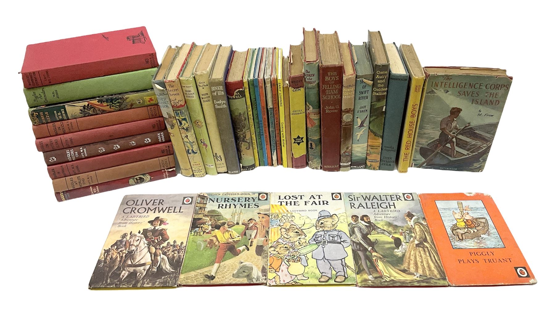 Nine books by Captain W.E Johns, including 'Biggles works it out', Biggles at World's End', 'Biggles in Australia', 'Biggles Presses on' etc, together with Enid Blyton books and other children's books 