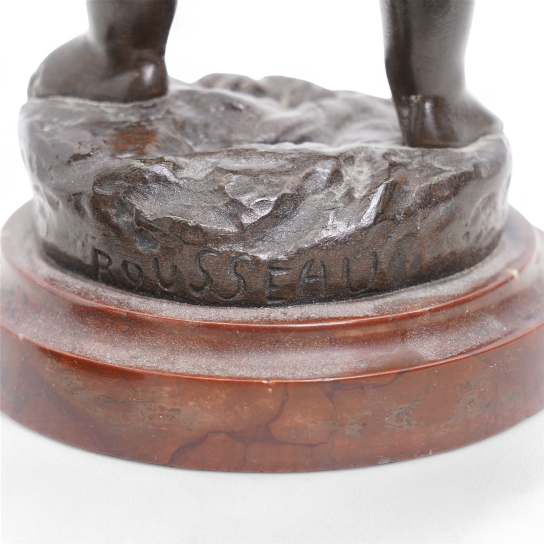 After Rousseau - Pair of bronze figures of cherubs, one holding a toy elephant, the other originally with an artists board on marble bases H23cm