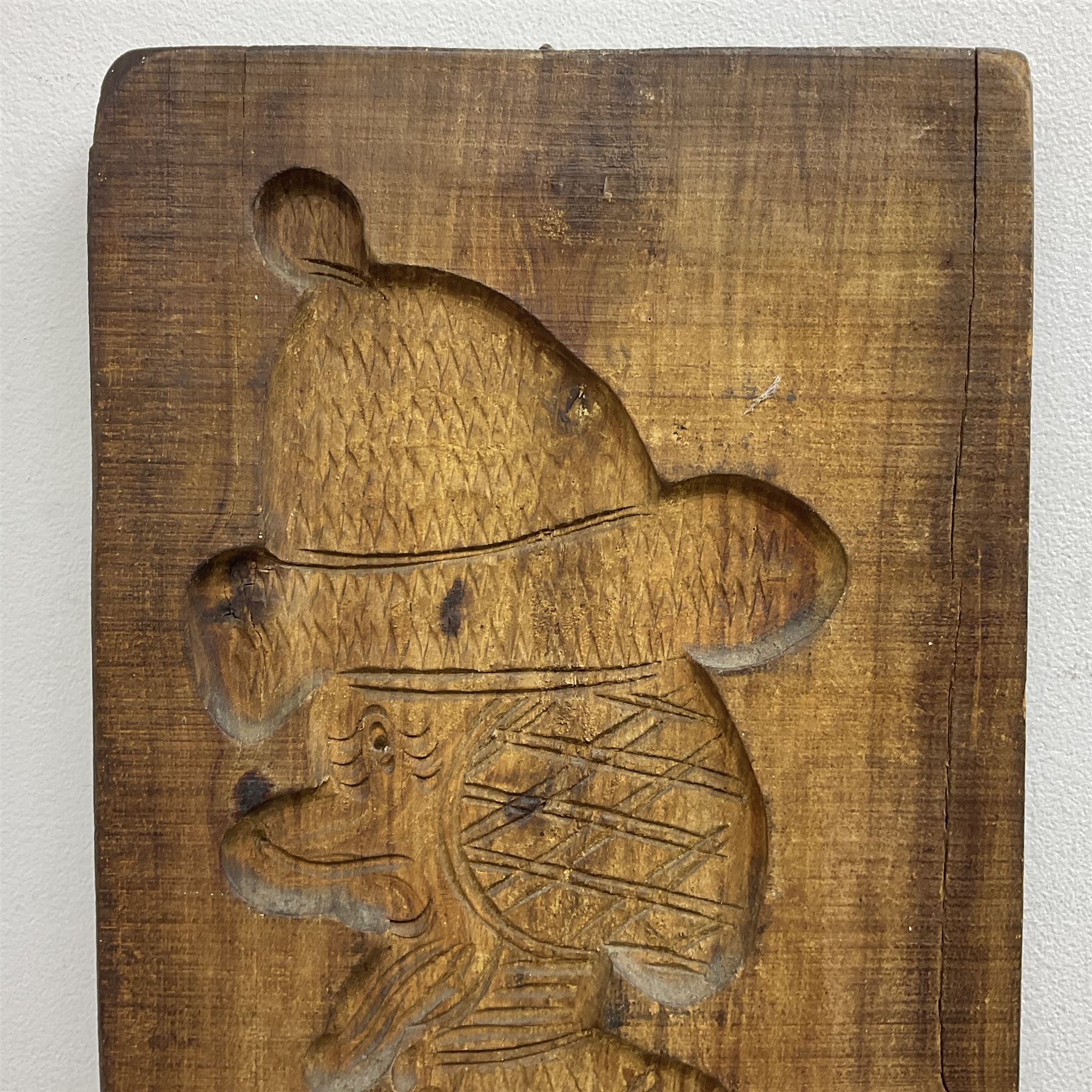 20th century hardwood Dutch folk art Speculaasplank or biscuit mould, typically carved with figure in traditional dress, H132cm