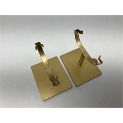 Pair of purple agate slices, polished with rough edges raised upon gilt metal stands