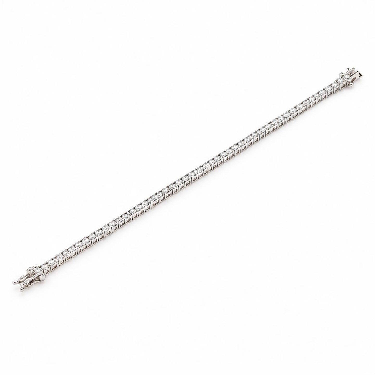 18ct white gold diamond line bracelet, set with seventy-six round brilliant cut diamonds, stamped, total diamond weight approx 2.30 carat