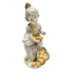 Lladro figure, Miss Valencia, modelled in traditional Valencian dress with basket of oranges, sculpted by Juan Huerta, with original box, no 1422, year issued 1982, year retired 1997, H18cm
