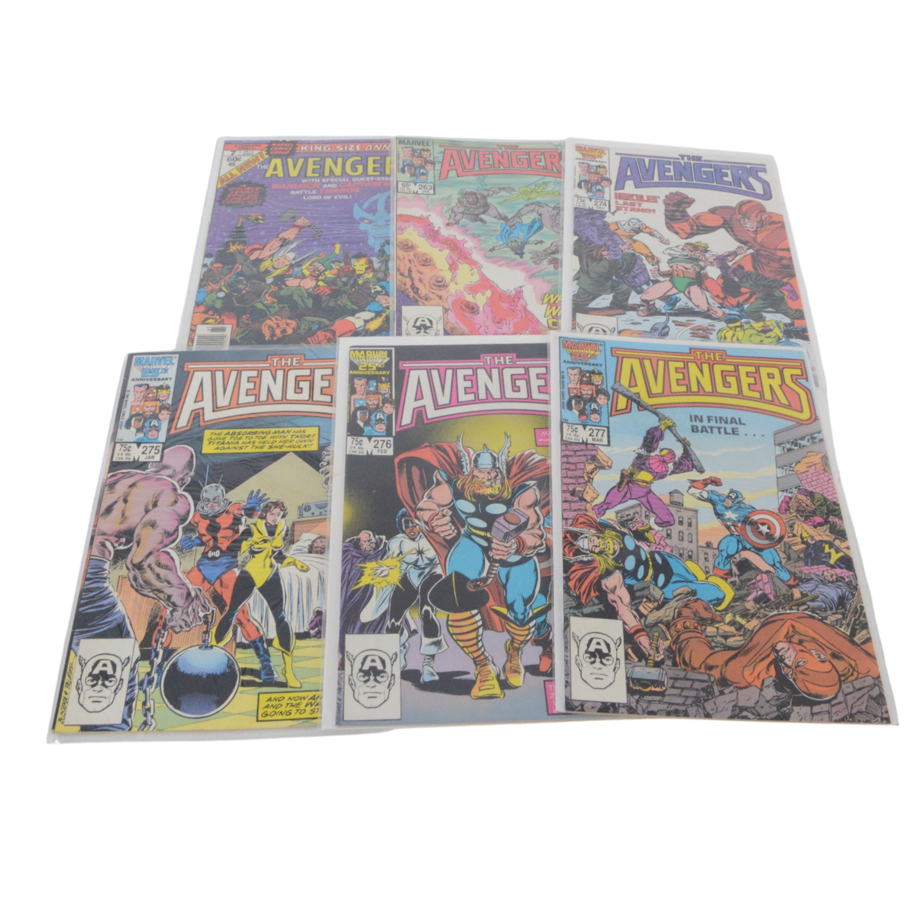 Thirty-five Marvel Bronze Age and later comic books, comprising sixteen 'The Avengers' #263, #274, #275, #276, #277, #278, #279, #281, #283, #285, #289, #291, #294, #295, #296, #297, King Size The Avengers Annual #7, 'Marvel One-Shot Thanos The Final Threat', 'Marvel Premiere Featuring Iron Fist' #24, True Believers 'Wolverine vs Hulk', 'The Thing' #1, four The Invincible Iron Man #59, #63, #71 and #100, eight Marvel Two in One 'The Thing' #2, #6, #11, #12, #18, #46, #50, #62 and #88 and one copy of 'The Sensational She-Hulk #4, mostly bagged