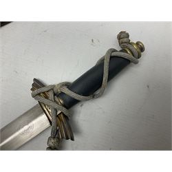 German Paul Weyersberg & Co Solingen DLV flyers dagger with 18cm steel blade, plated brass/tombac downswept cross-piece and pommel and leather covered grip, in leather and plated brass/tombac scabbard with leather hanger strap and silvered knot L35cm overall. Auctioneer's Note: After WWI Germany was forbidden an air force by the Treaty of Versailles however the Deutscher Luftsport-Verband (German Air-sport Association) was formed in March 1933 from various sports flying clubs and had branches for aeroplane, gliding and balloon flying. Under cover of the sporting DLV, many future Luftwaffe pilots trained to fly. DLV was embodied with the NSKK in March 1935 and on 1st March 1937 Luftwaffe was formed.