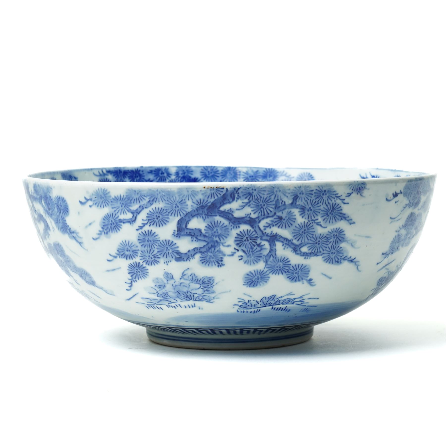 Japanese blue and white bowl, the central bowl painted with bird, surrounded by a border of trees, unmarked, D31cm 