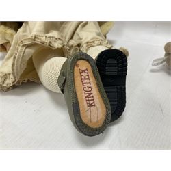 Two Zapf Creation limited edition designer collection dolls, by Brigette Paetsch, the first example with faux suede jacket, red jumper and denim skirt, no. 460, the second example 'Linda' in white dress with teddy bear accessory, no. 785, each signed B Paetsch, tallest L60cm