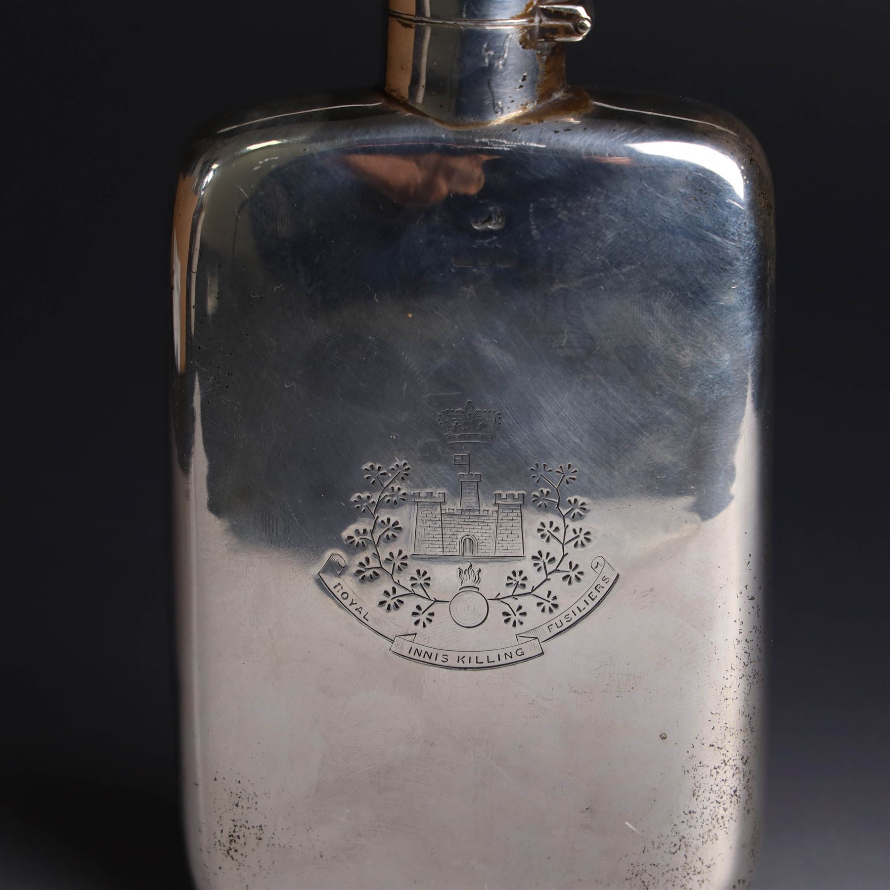 Late Victorian silver hip flask, of typical rectangular form, engraved with Royal Inniskilling Fusiliers crest to front, hallmarked Birmingham 1893, maker's mark worn and indistinct, H14cm