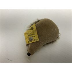 Group of Steiff figures, comprising Mikki and Mukki, circa 1950s no 7628/12 and 7627/12, with original tags, two hedgehogs no 1570/10, and another smaller 1670/03, small owl no 7480/06, and painted metal Steiff harlequin style bear