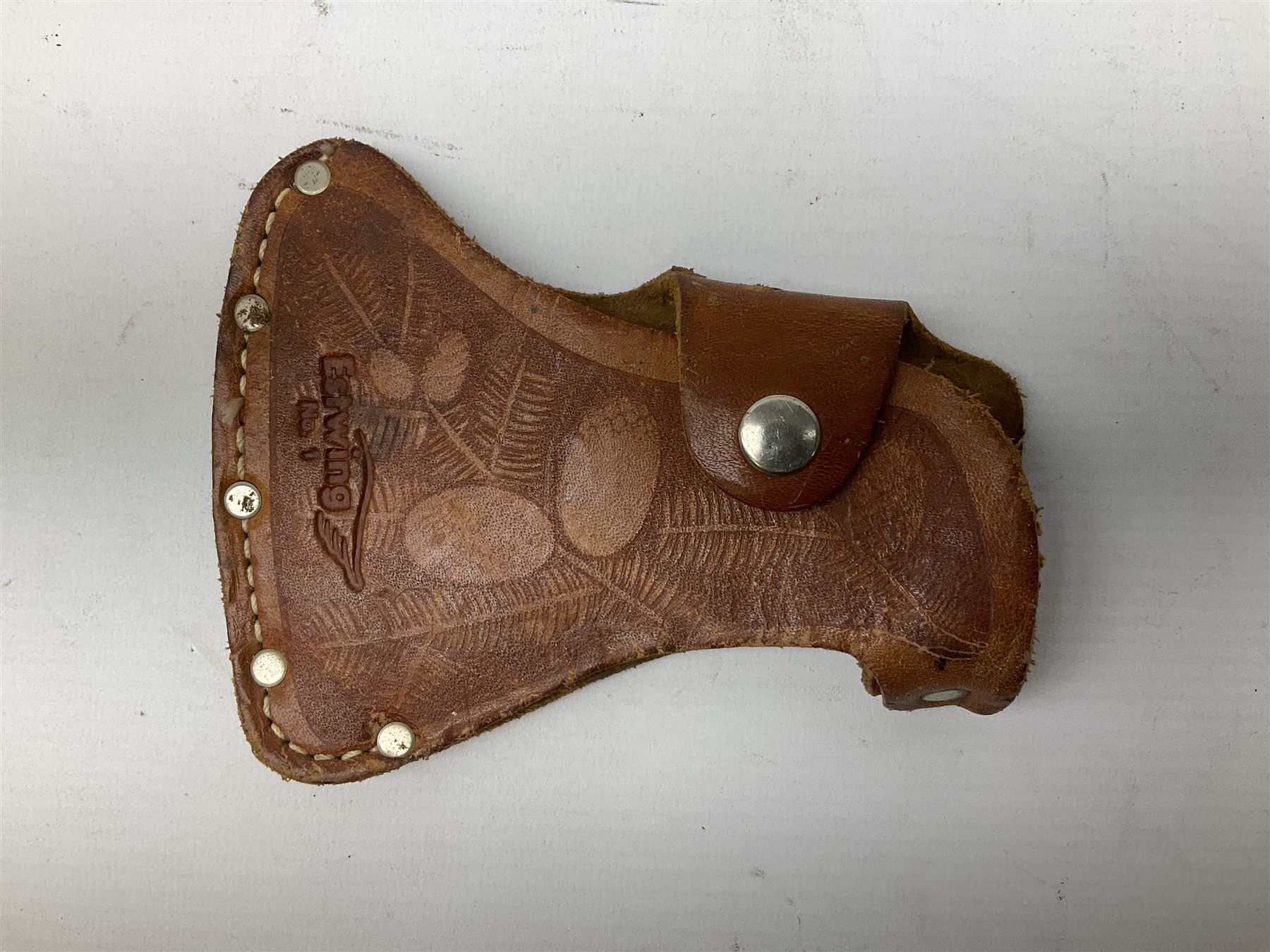 Estwing Black Eagle style double bit throwing axe with leather grip, virtually mint with labels present, plastic blade protectors and nylon sheath L43cm; another smaller Estwing axe stamped 24A to the pommel, with leather grip and sheath; and a vintage short handled hedge knife, the blade stamped IH (?) No.2 (3)