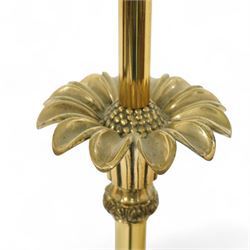 Late Victorian brass standard lamp with shade, slender column with blooming lotus leaf floral base with raised acanthus leaf scrolls above a tripod stand with scroll legs 