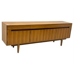 Younger - 1960s teak sideboard, three drawers over three cupboard, centre draw lined with baize with dividers, recessed handles with tapered feet