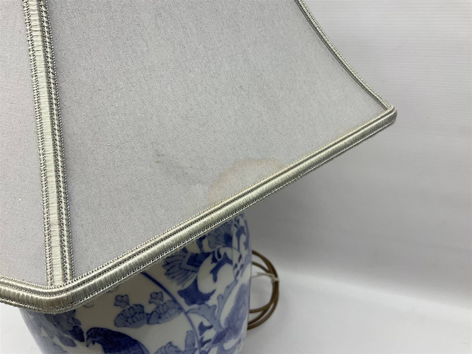 Chinese blue and white table lamp of baluster form, decorated with birds and floral displays, on hardwood base with shade, H78cm