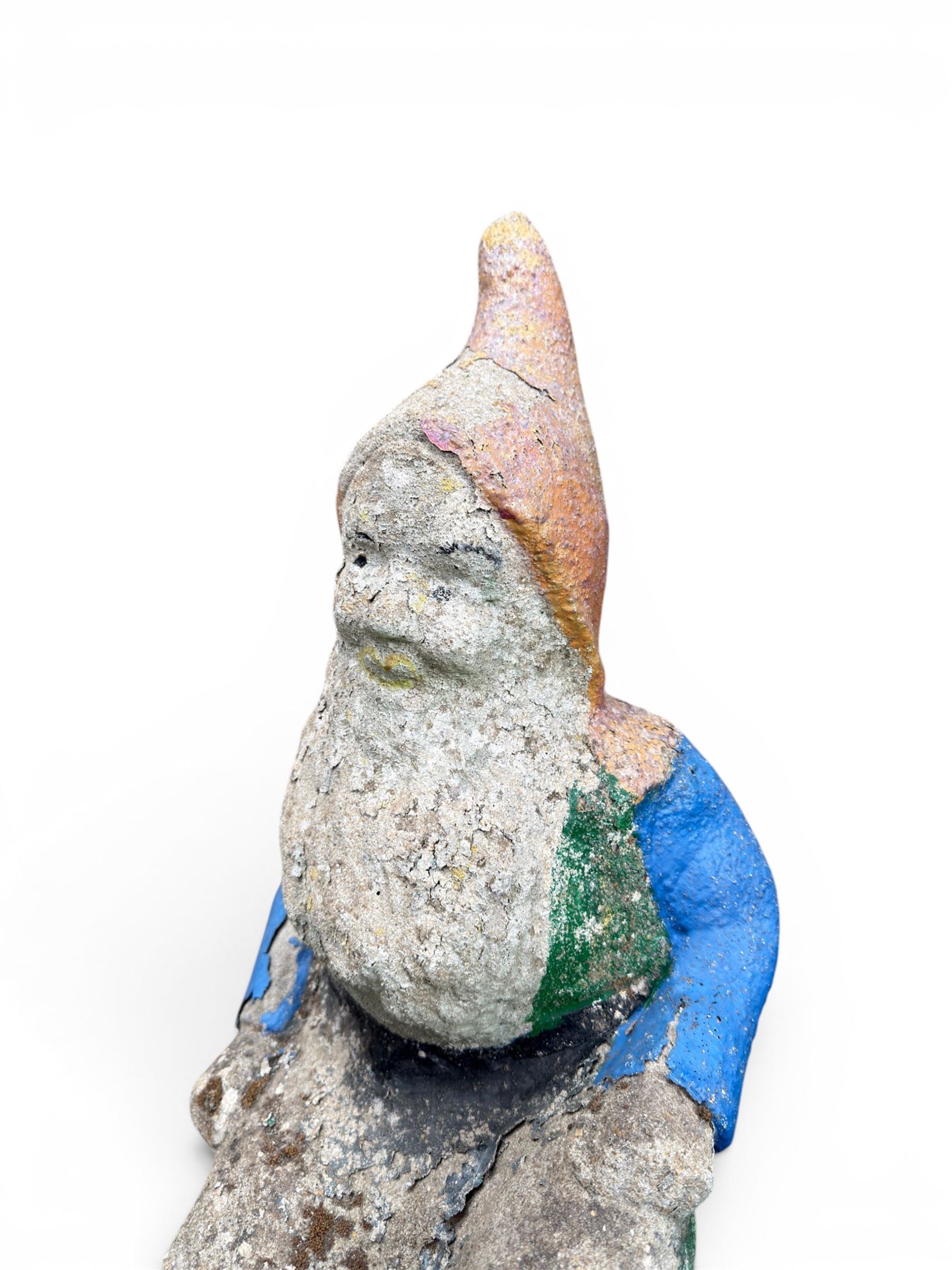 Early large scale composite stone garden gnome, original distressed paint