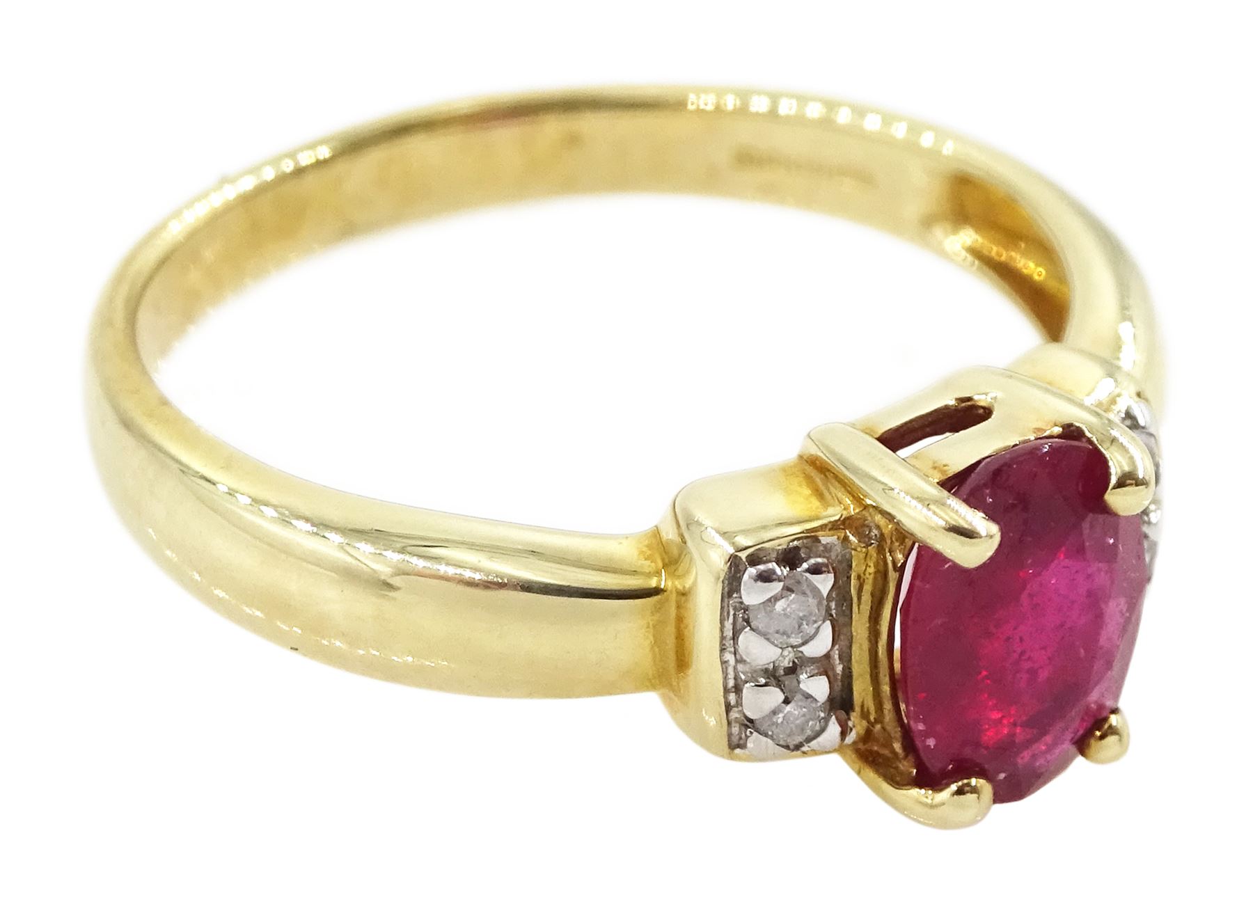 9ct gold single oval cut ruby and four stone, round brilliant cut diamond ring, hallmarked, ruby approx 0.75 carat
