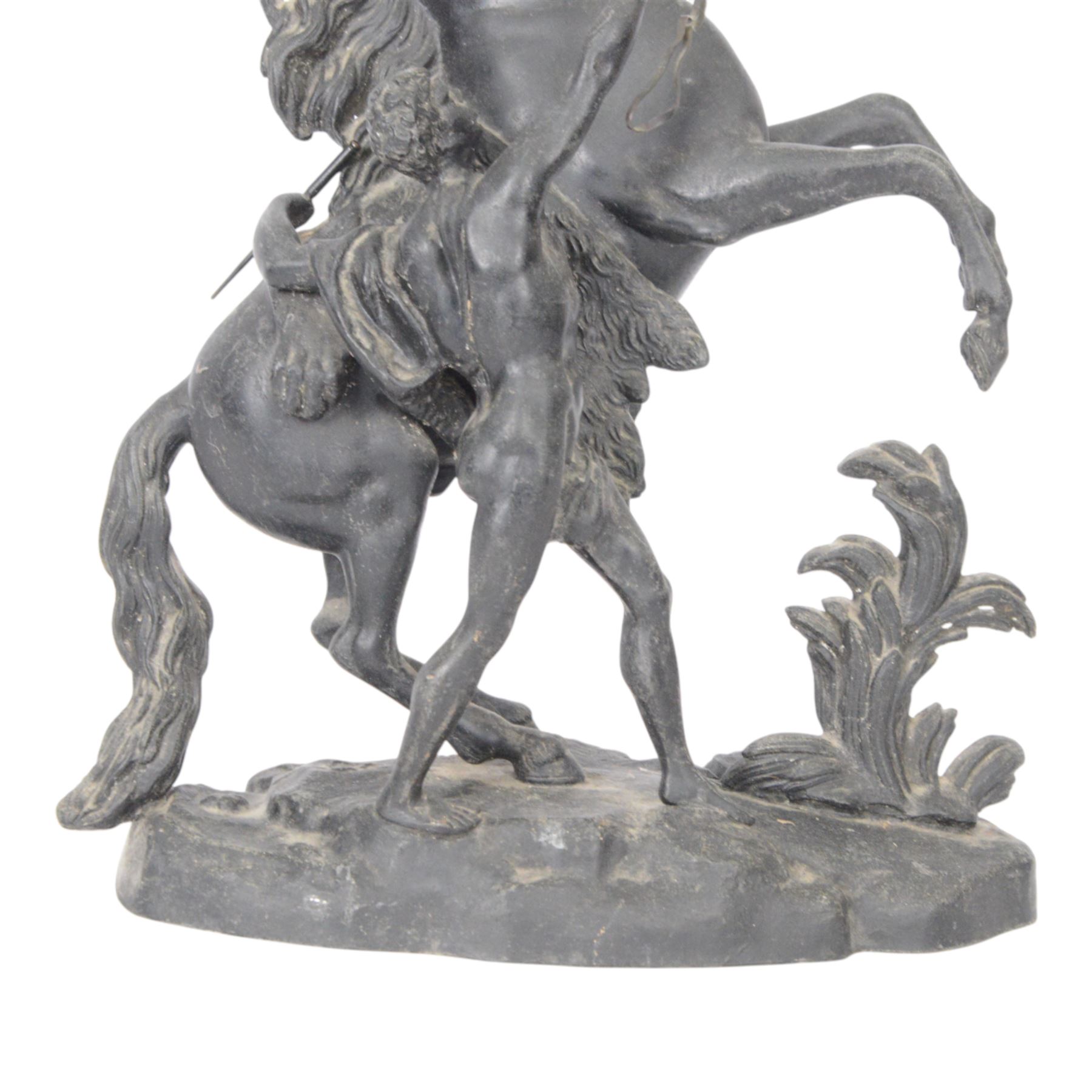 Three spelter Marley Horse figures, after Guillaume Coustou, each modelled as a rearing horse restrained by  groom, tallest H41cm