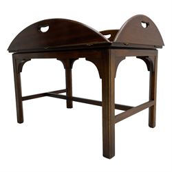 Mahogany butler's tray top coffee table, the removable tray with hinged sides and ends pierced with handles, on square moulded supports united by H stretcher 