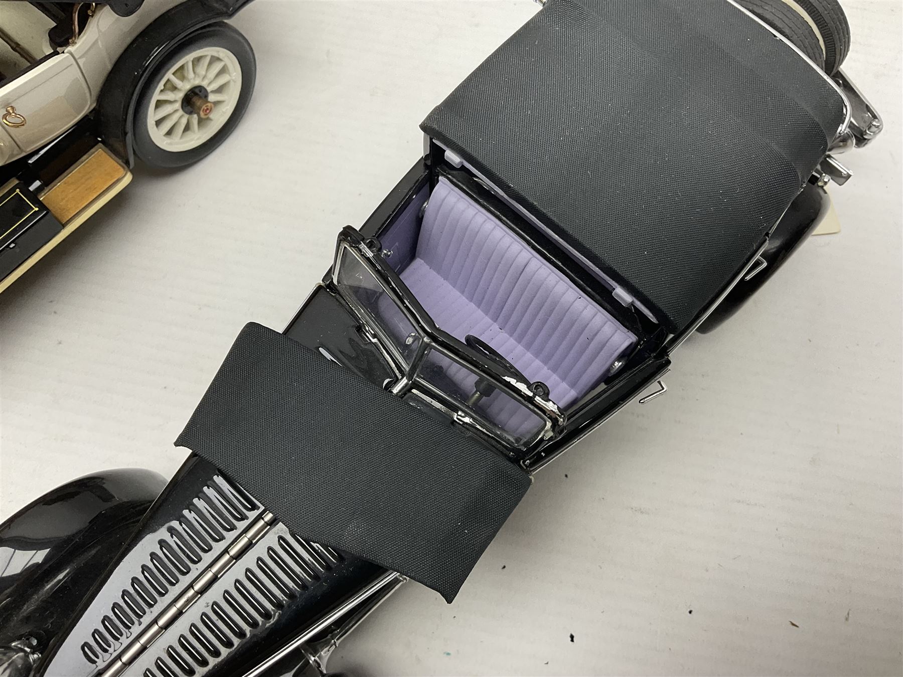 Four Franklin Mint 1:24 scale model cars, to include 1940 Duesenberg, 1912 Packard Victoria, 1935 Duesenberg and 1911 Rolls Royce, together with other diecast vehicles including Matchbox Models of Yesteryear, Lledo etc