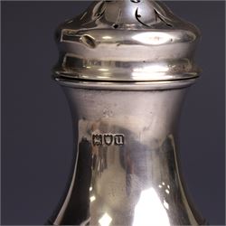 Early 20th century silver sugar caster, of typical form with removable pierced cover and upon circular foot, hallmarked Charles Edwards, London 1916, H18cm