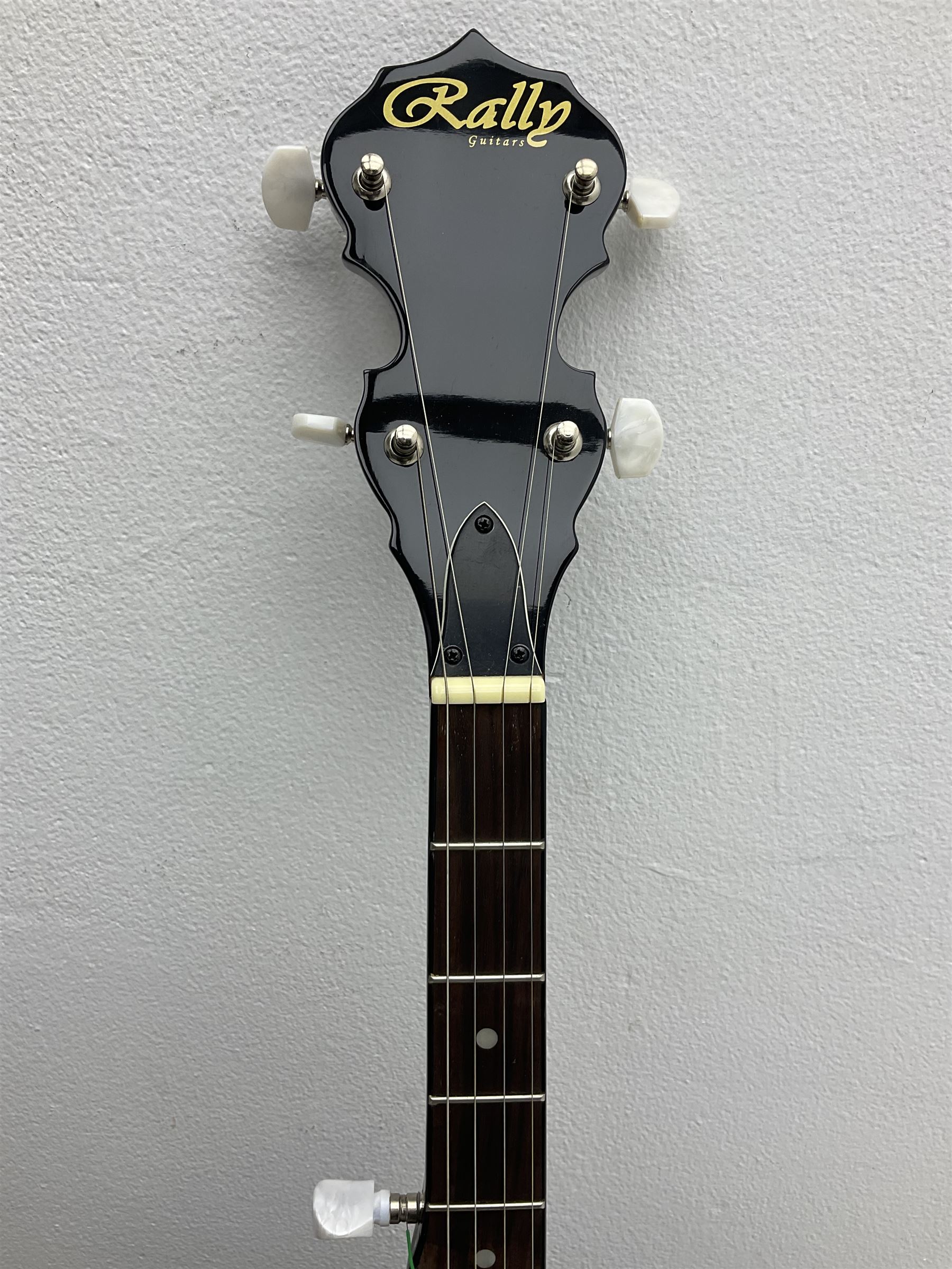 Rally five-string banjo with mahogany solid back L101cm in soft carrying case; and Brunswick Model BF200 acoustic guitar L103cm; with small quantity of instructional DVDs and booklets