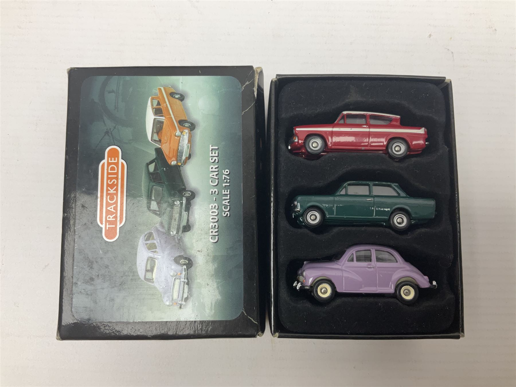 Over forty 1:76 scale die-cast models of cars and commercial vehicles; some boxed; and eight small scale models of motorcycles; all unboxed