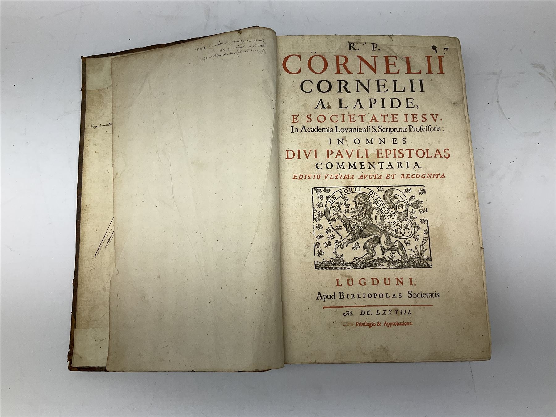 Three 17th century Lugduni (Lyon) printed books each with engraved title page in red and black comprising R.P. Corn Cornelii A Lapide .... Tomus Primus. 1690; R.P. Cornelii Cornelii A Lapide .... 1683; and Hortus Pastorum Sacrae Doctrinae Floribus Polymitus .... 1668. All folio with full calf bindings (3)
