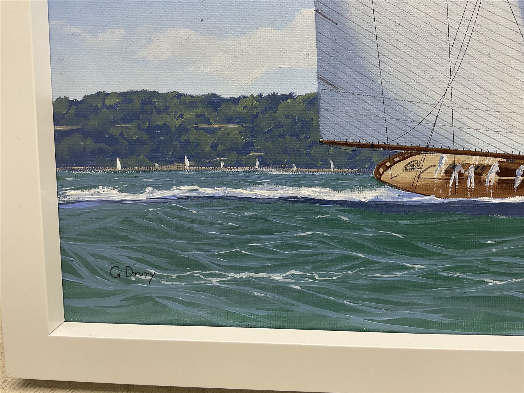 George Drury (British 1950-): 'Lulrock and Shamrock Racing On the Solent', oil on board signed, titled verso 39cm x 49cm