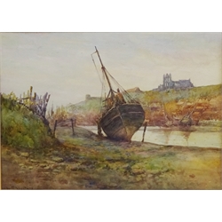 Boat at Low Tide, Whitby Harbour, watercolour signed by Willie Rawson (British mid 20th century) 24cm x 34cm  