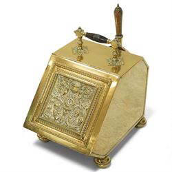 Late 19th century brass coal box, tapering rectangular form with hinged lid featuring reli...