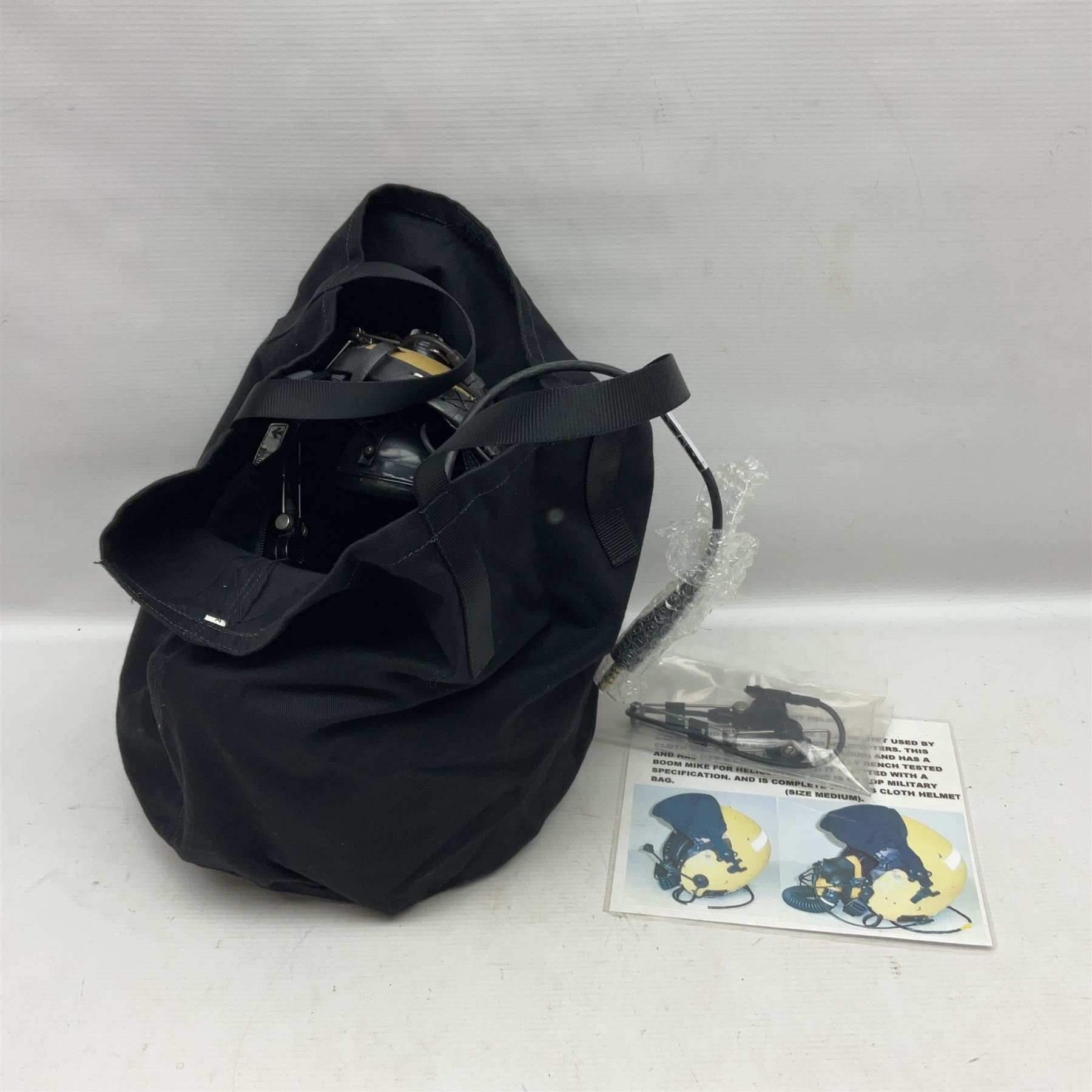 Mk.4 Flight Helmet, as used by RAF and Civilian helicopter pilots; in RAF sand colour (desert use),  fitted with cloth visor cover and working boom mike; has had a complete refit and is bench tested.