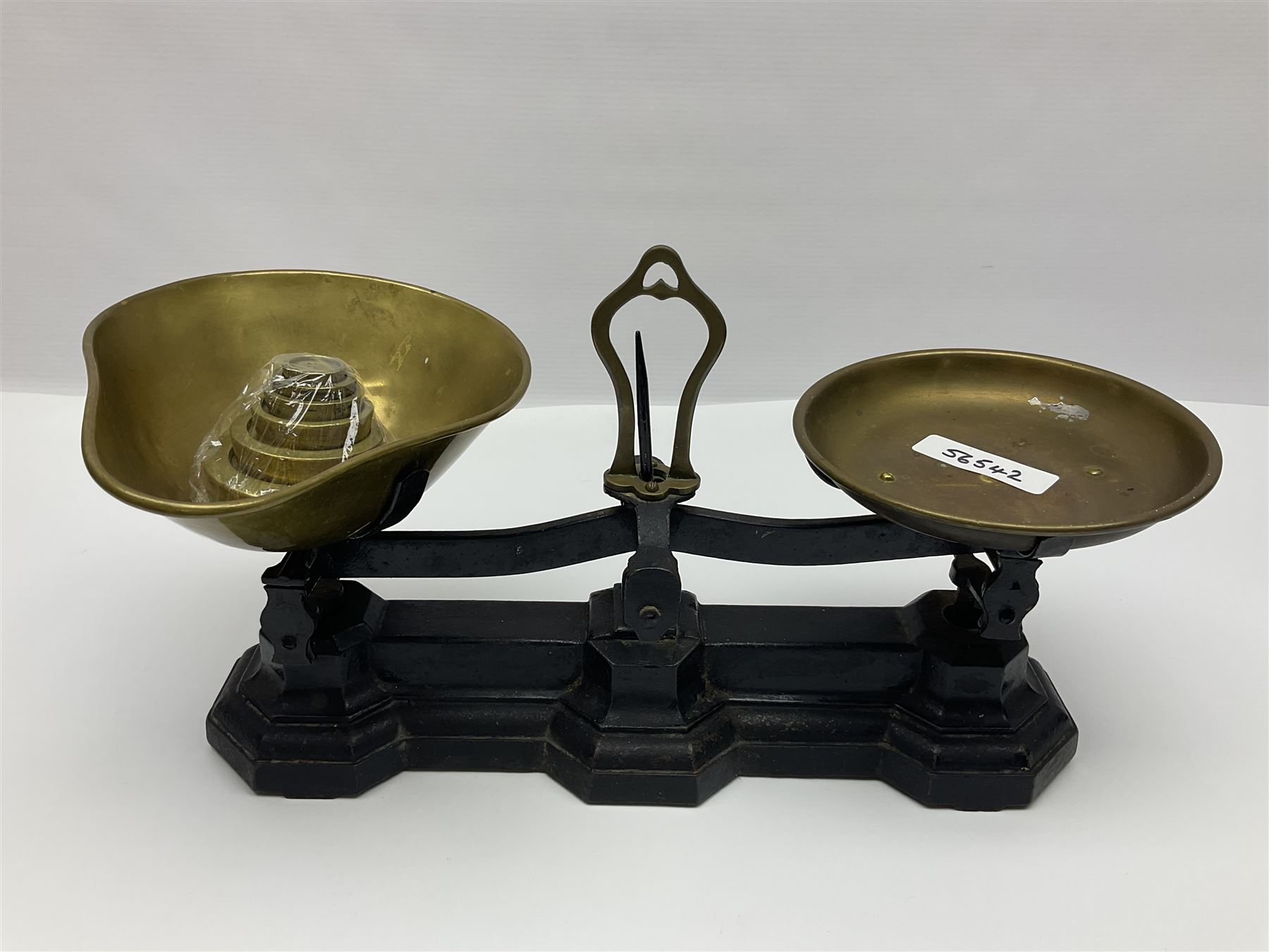 Black painted and brass kitchen balance scales with graduated set of brass weights
