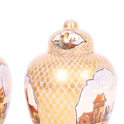 Pair of 19th century Dresden urn and covers, the central panels decorated with figures in landscapes, surrounded by gilt decoration, H15cm 