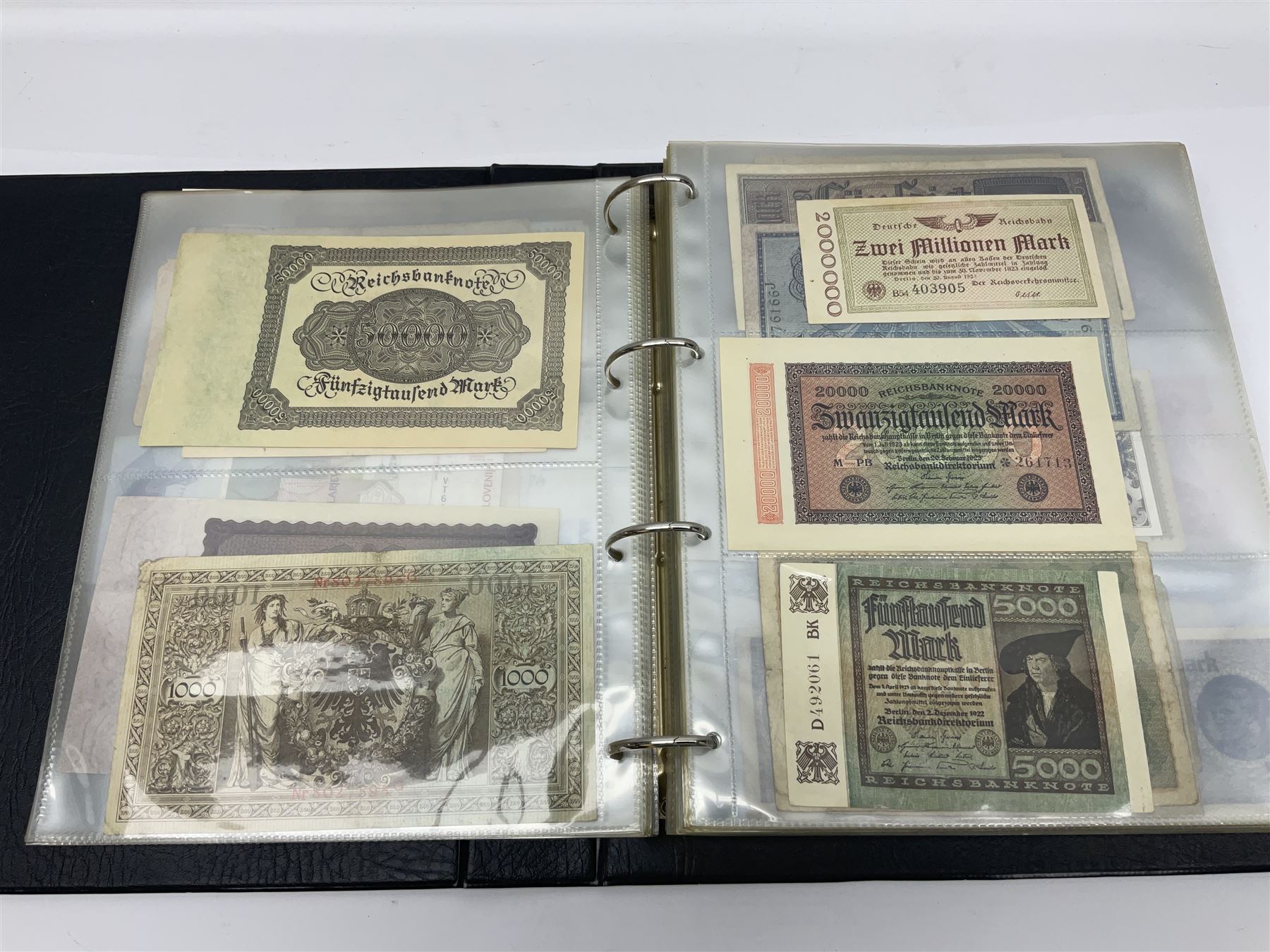 World and Great British banknotes to include Brazil, Canada, France, Germany, Ghana, Indonesia, Iraq, Hong Kong, Hungary, Japan, Vietnam, Zimbabwe, a collection of Chinese ‘Hell Money’, and quantity of ‘De La Rue Systems’ test notes, housed in ring binder and loose