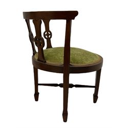 Pair of Edwardian mahogany tub shaped chairs, wheel motif back