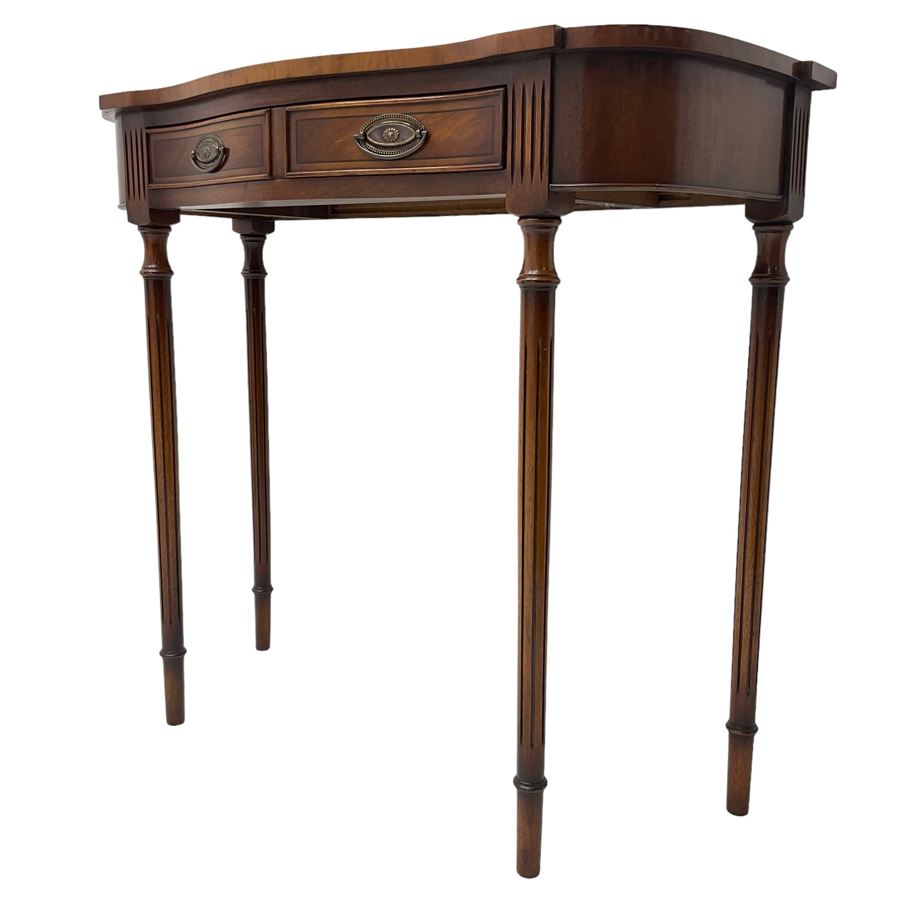 Regency design mahogany serpentine console table, fitted with single drawer disguised as two with cockbeaded facia, raised on fluted tapering supports