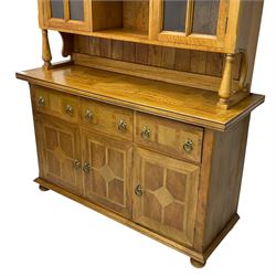 Barker & Stonehouse - flagstone dresser, raised display cabinets and shelves over three drawers and three cupboards, on turned feet 