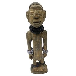 Early 20th century West African Yoruba family wooden figure of Orisha Oko, the god of farming/agriculture, carved from the solid, bears manuscript label of provenance verso H26.5cm