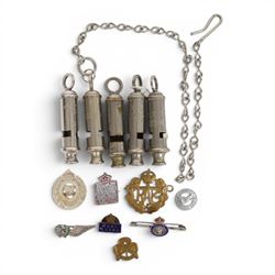 Collection of WWII ARP warden's whistles and similar together with RAF badge and similar 
