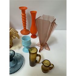 Quantity of coloured glass to include Art Deco style pink vase of fan form, orange candlestick, pin dishes, flower frog etc