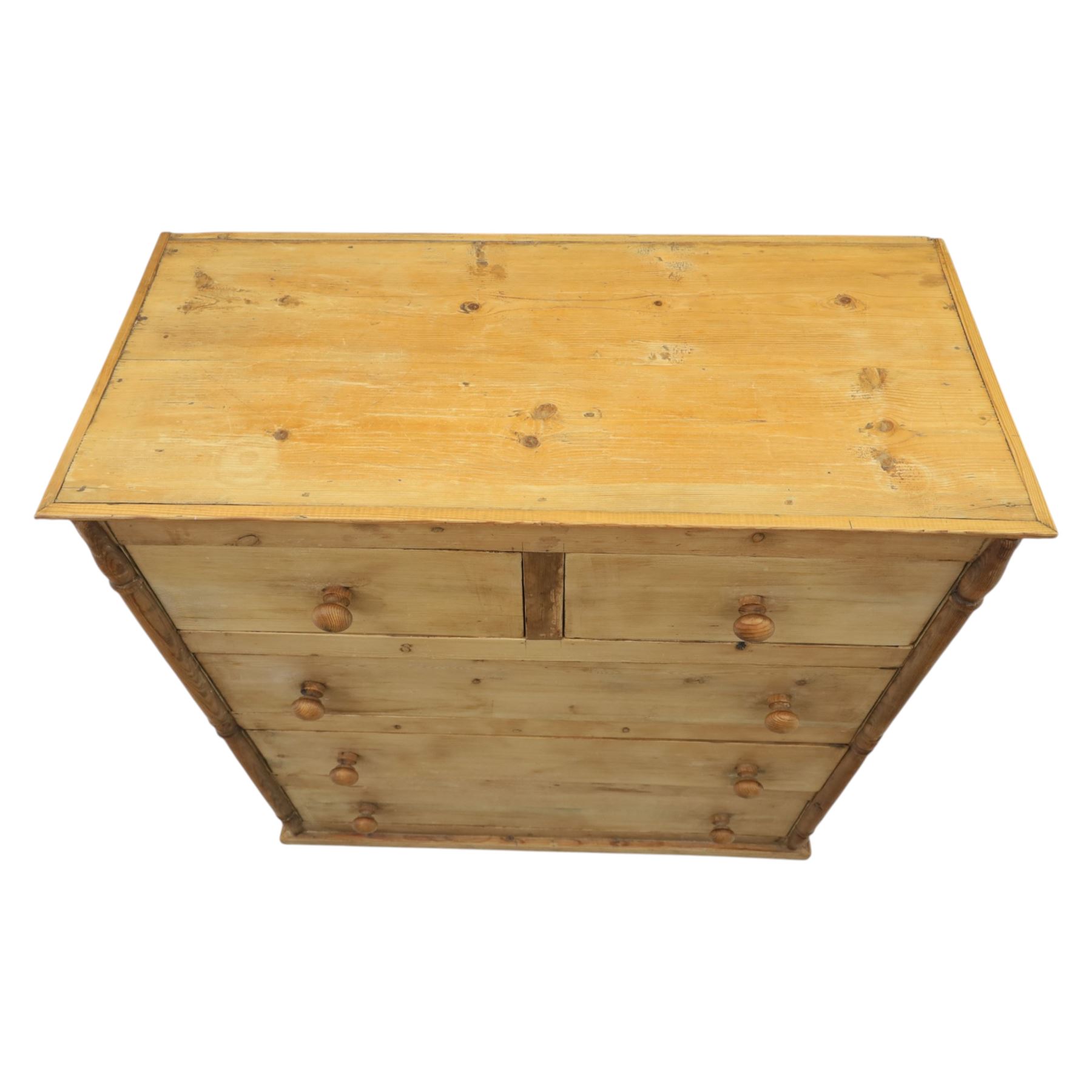 Victorian polished pine chest, straight front with panelled sides, fitted with two short and three long drawers, turned wooden handles