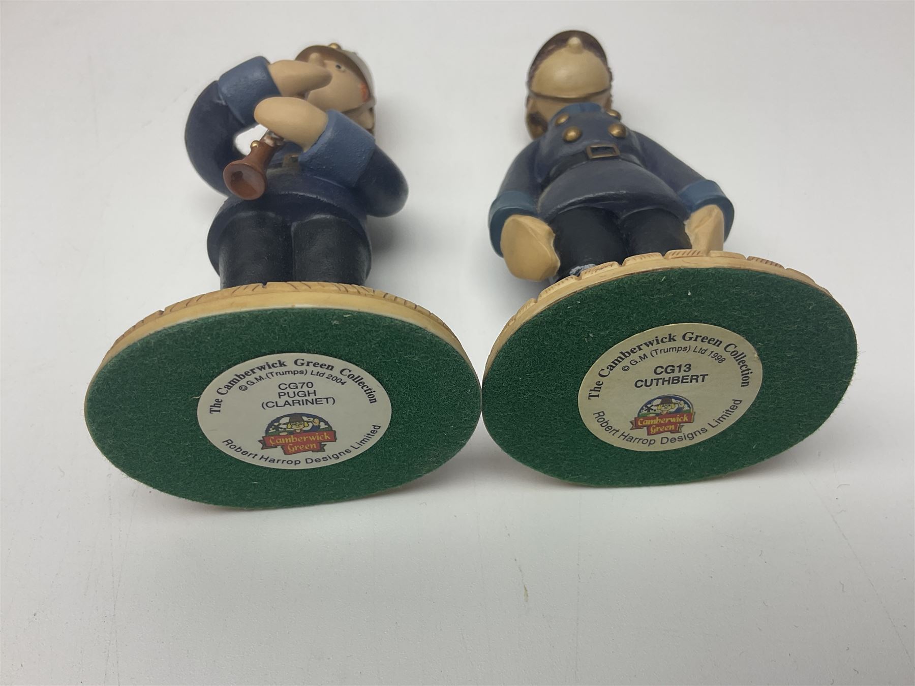 Eleven Robert Harrop figures from various collections, comprising limited edition The Trumpton Fire Engine Musical Box CGMB8 no. 359/1000, The Dragon from the Red Knight BN09, Bulldog Fireman DP165, Pointer Fire Chief DP184, Dalmatian New York Fire Fighter DP234, Dalmatian Fire Fighter DP191; Desperate Dan ‘Fireman Dan’ BDS11, Cuthbert CG13, Pugh (Clarinet) CG70, The Soup Dragon CL05 and Baby Dragon CL06